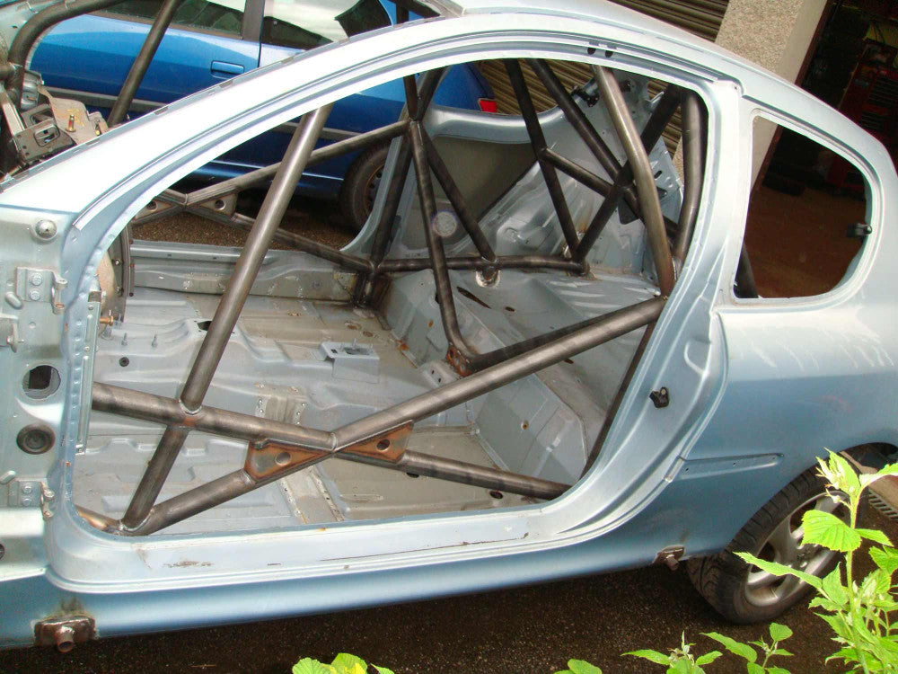 kit de jaula de seguridad multipunto CDS para PEUGEOT 206. Certificado por la FIA